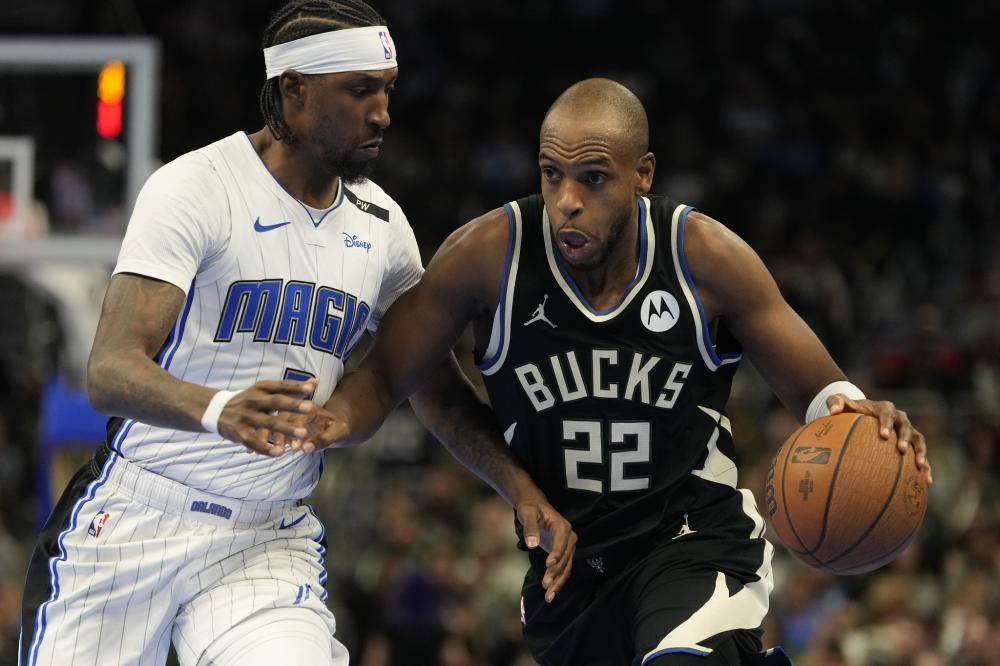 将由美国 将由美国